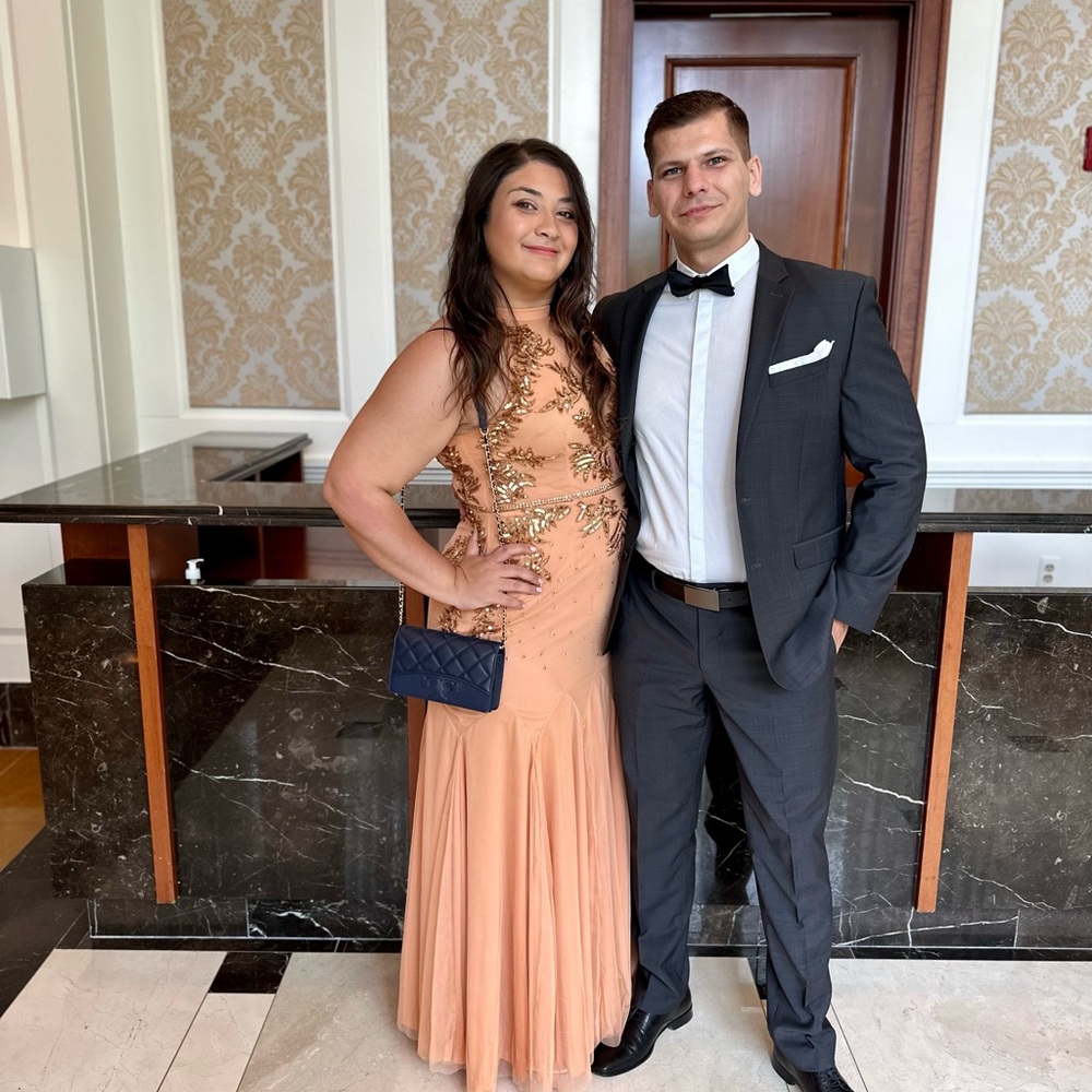 Hand embroidered peach evening gown